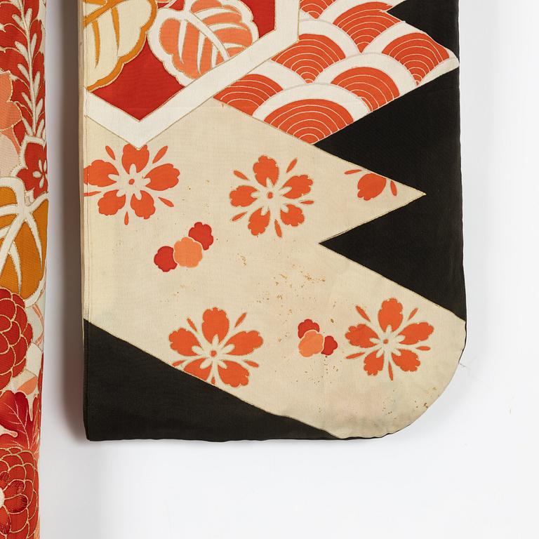 A painted and embroidered silk kimono. Japan, 20th century.