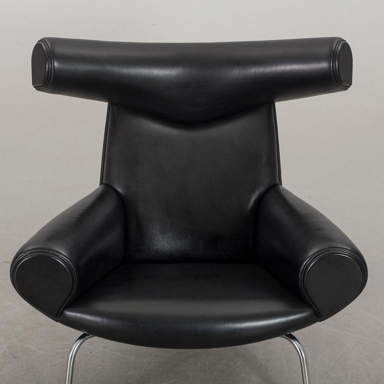 HANS J WEGNER, "Ox chair" lounge chair and stool.