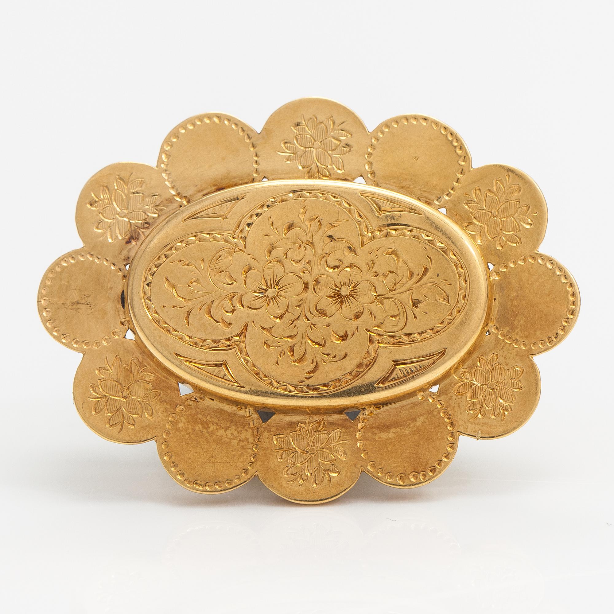 An 18K gold brooch/pendant. Johan Edvard Fagerroos, Helsinki 1862.