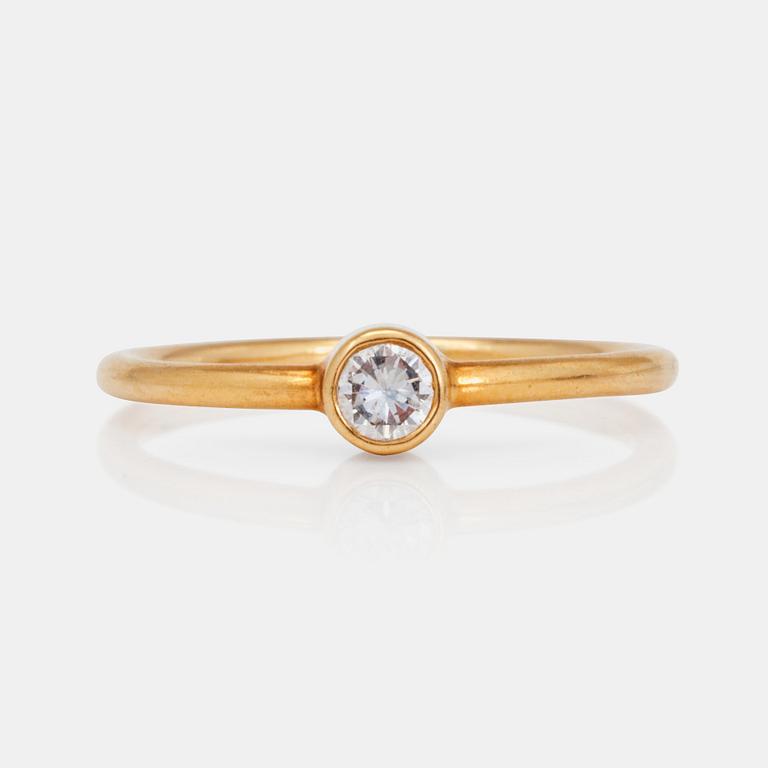 RING, signerad Cartier, med briljantslipad diamant ca 0.15ct.