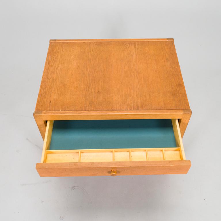 A mid-20th-century sewing table.