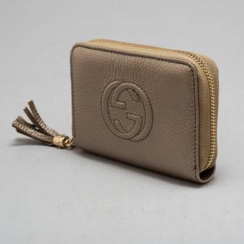 a Gucci wallet.