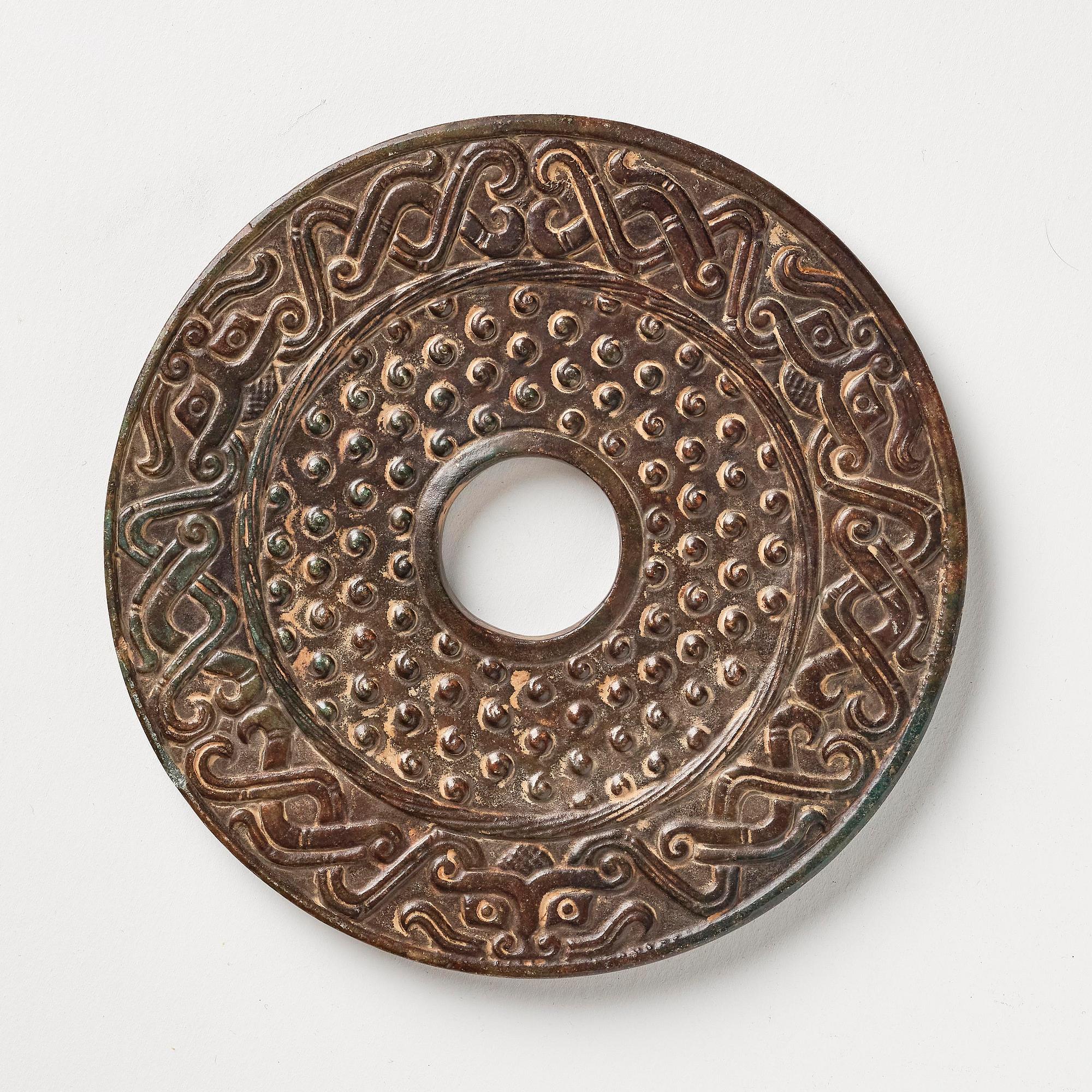 An archaistic bi disc.