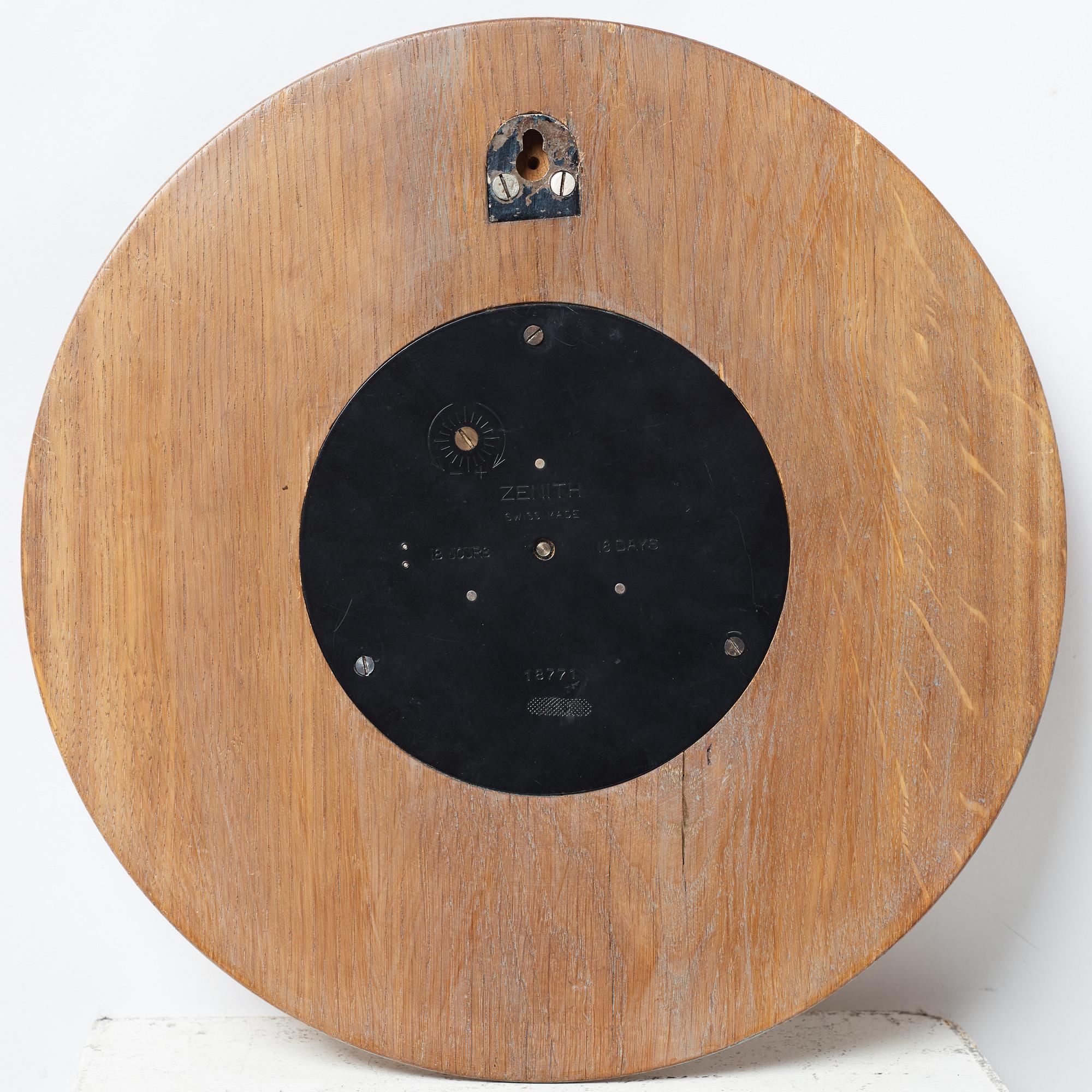 A wall clock, marked Zenith, Swiss made, 18 jours. 18771.