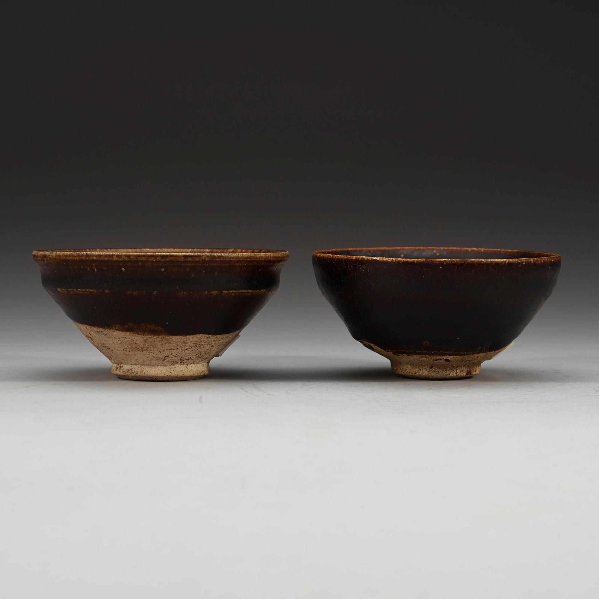 A set of two odd temmoku jianyao bowls, Song dynasty (960-1279).