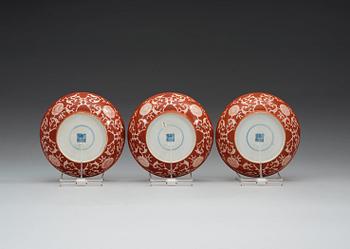 A set of three coral red dishes, Qing dynasty, with Daoguang seal mark.