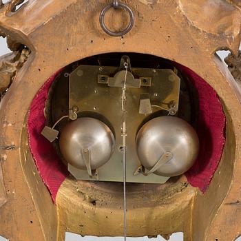 A mantlepiece clock with console from the second half of the 19th century.