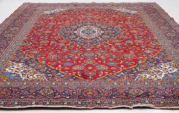 An Oriental carpet, c. 396 x 300 cm.