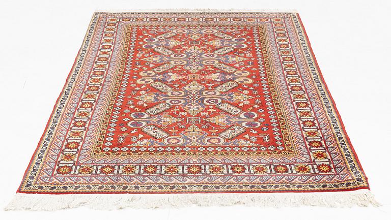 A rug, 215 x 130 cm.