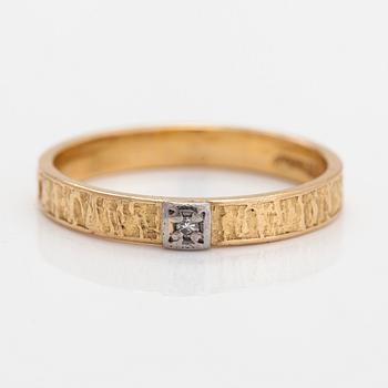 Björn Weckström, An 18K gold ring 'Timanttikihla' with a ca. 0.02 ct diamond. Lapponia 1970.