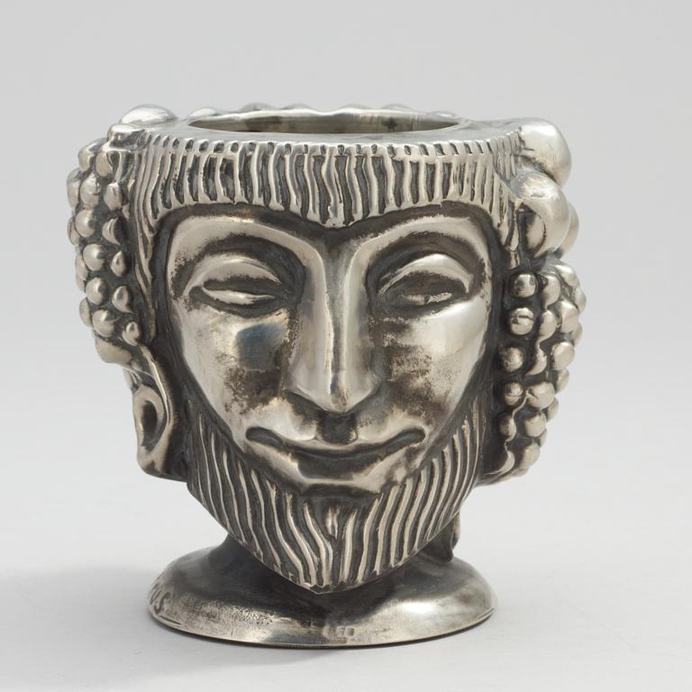 An Anna Petrus "Janus head" pewter vase by Svenskt Tenn 1993.