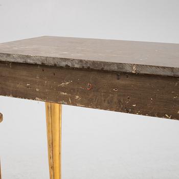 A console table with stone top.