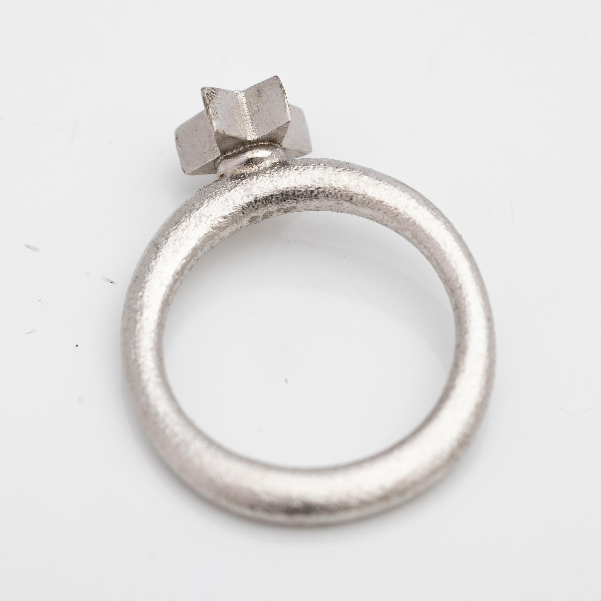 Ole Lynggaard, Ring, “Love”, 18K white gold with brilliant-cut diamonds, designed by Charlotte Lynggaard.