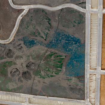 A pair of stained glass windows, circa 1900.