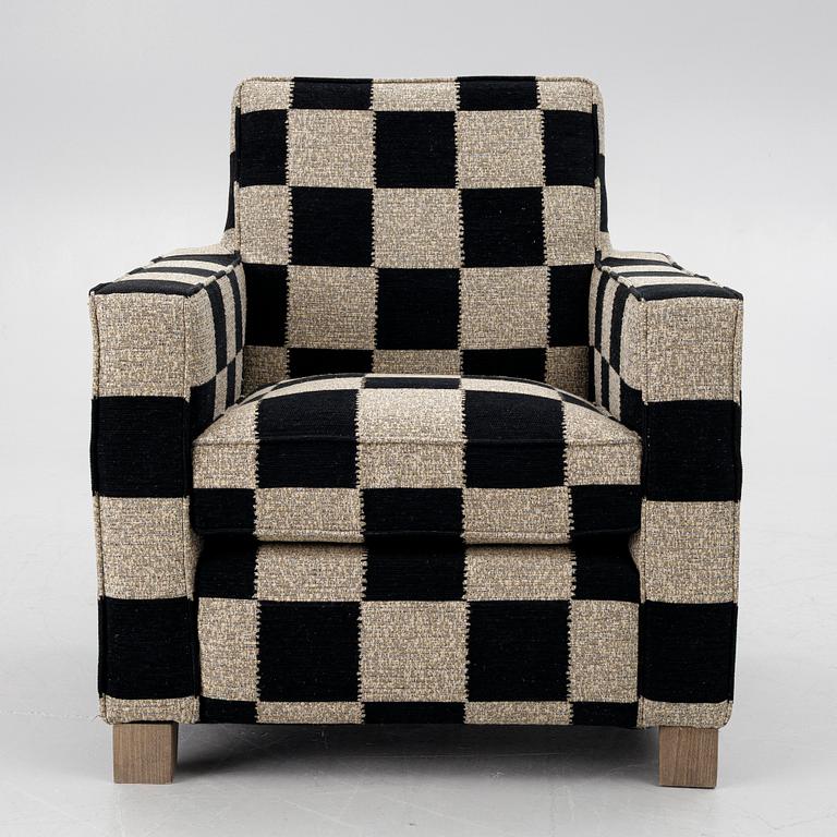 A 'Caspian Club Chair' by RIJD, contemporary.