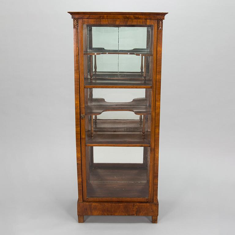 A mid-19th-century vitrine cabinet, possibly from the Baltics.