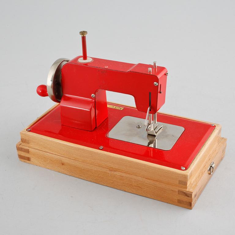 A toy Regina sewing machine from Germany from the mid 20th century.