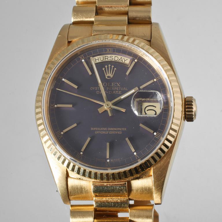 ARMBANDSUR, herr, 18 k guld, "Day-date", Rolex. Total vikt ca  140 g.