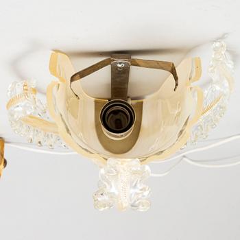 a pair of glass wall lamps from Orrefors in the mid 20th century.