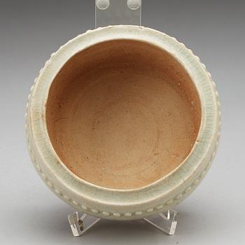 A pale celadon glazed tripod censer, Yuan dynasty (1280-1367).
