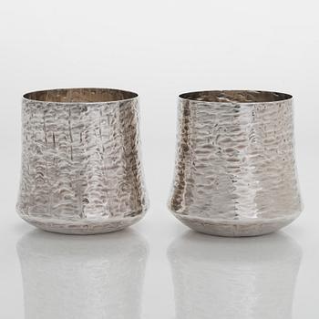 Tapio Wirkkala, a sterling silver pitcher with eight beakers, Hämeenlinna Finland 1973-1978.