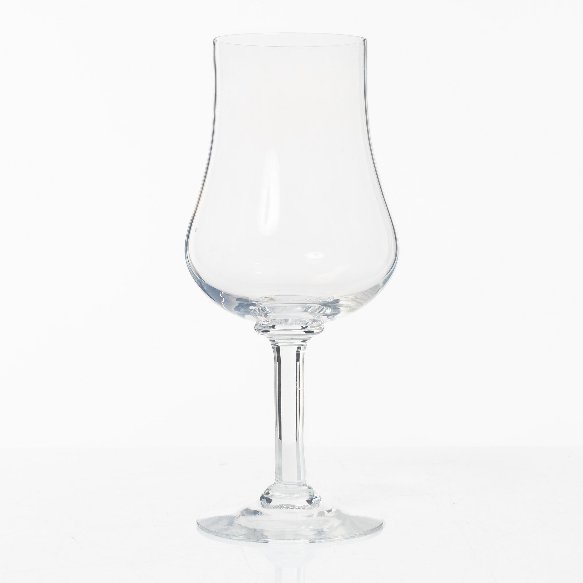 A set of 46 glass service parts, including 'Elixir Connoisseur' and Gunnar Cyrén, 'Optica', Orrefors.