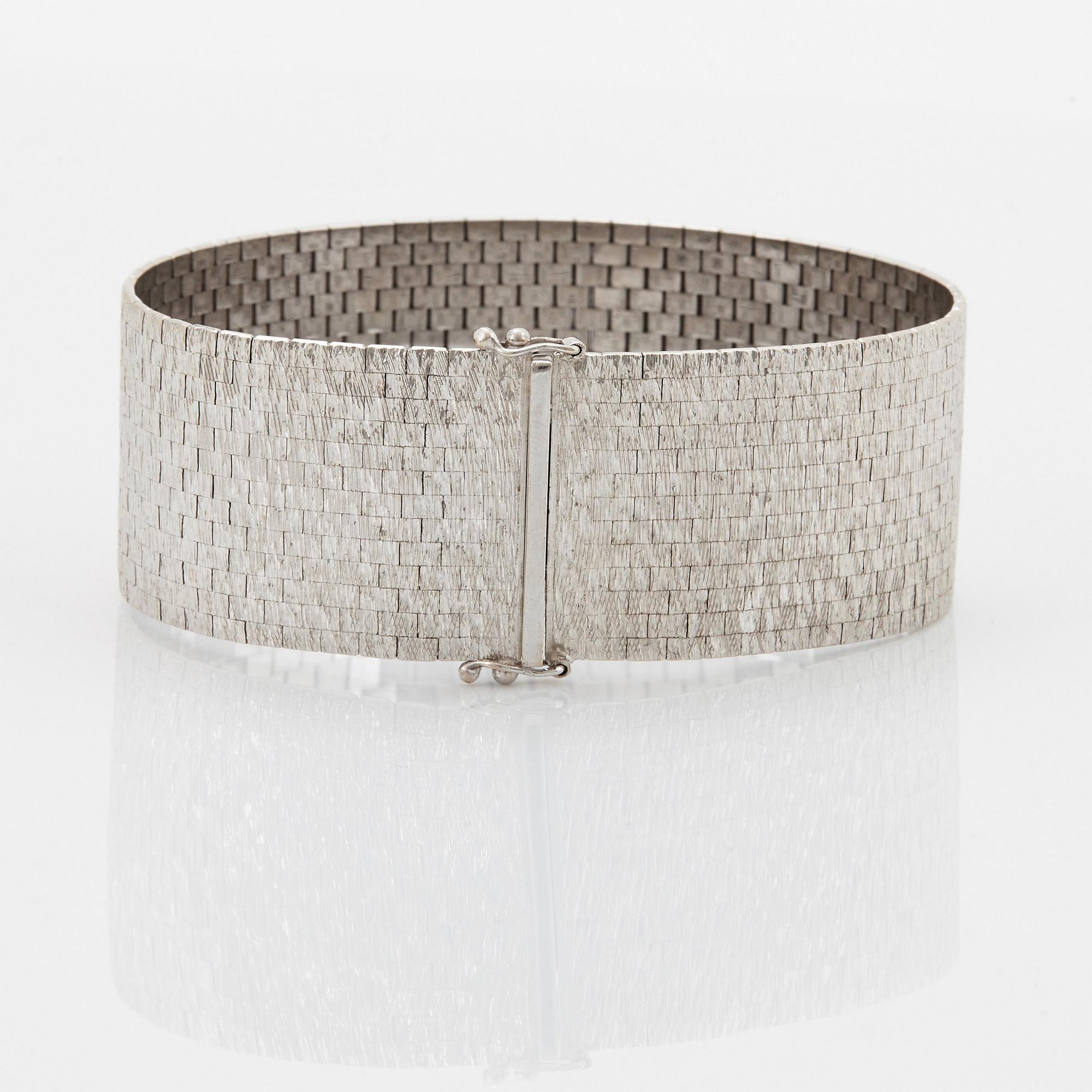 Bucherer armband 18K vitguld.