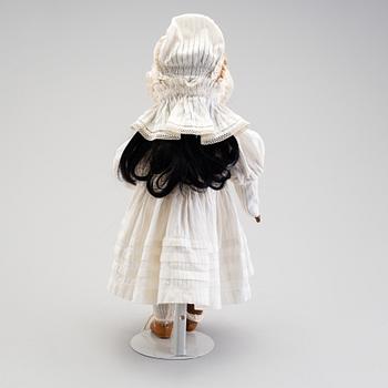 A bisque head doll, early 20th century.