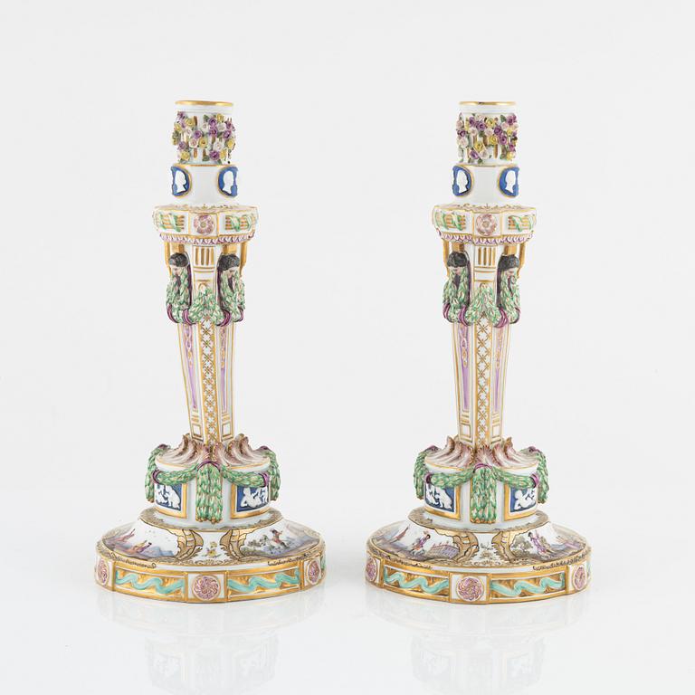 A pair of Meissen candle sticks, circa 1900.