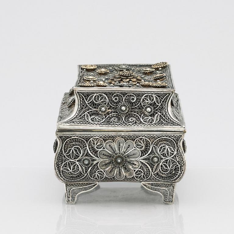 A 19th Century silver filigree box, unidentified makers mark R.K, Assay master mark of Ivan Lebedkin, Moscow 1898-1908.