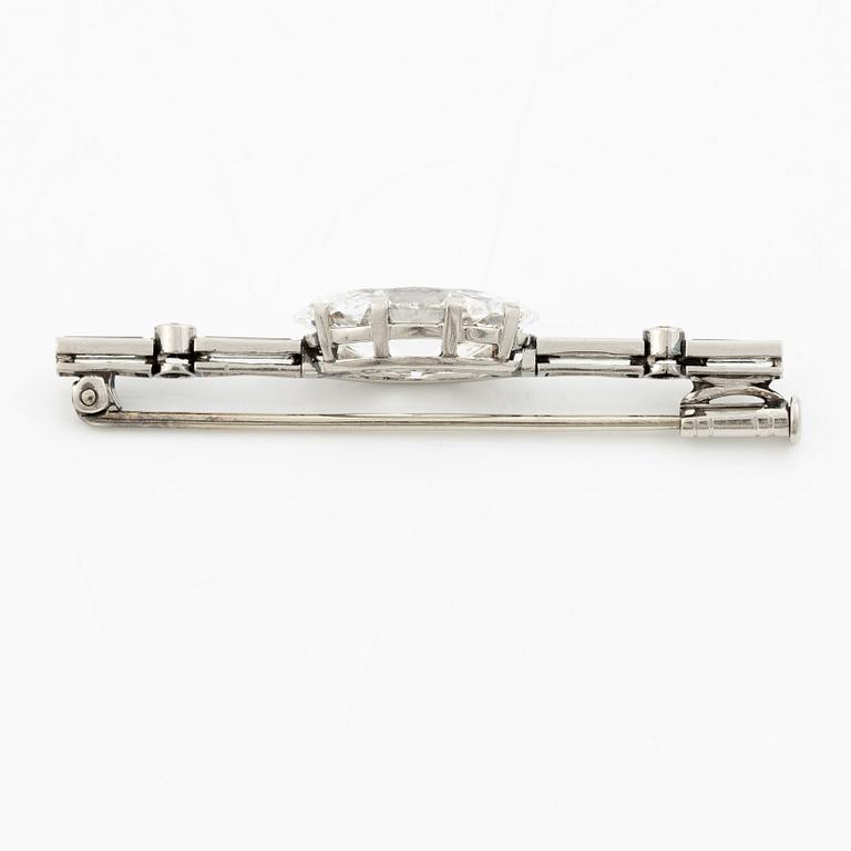 A brooch in platinum with an old-cut navette-shaped diamond ca 3.65 ct.