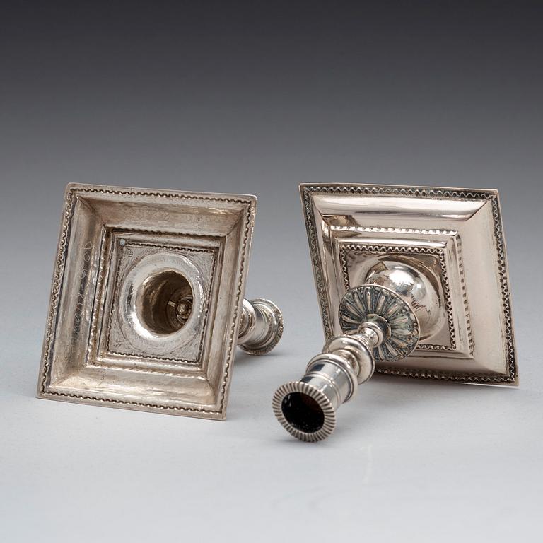 A pair of German late 17th century silver candelesticks, marks possibly of Heinrich Eichhoff, Hamburg, 1697.