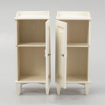 A pair of Gustavian style bedside tables, late 20th century.