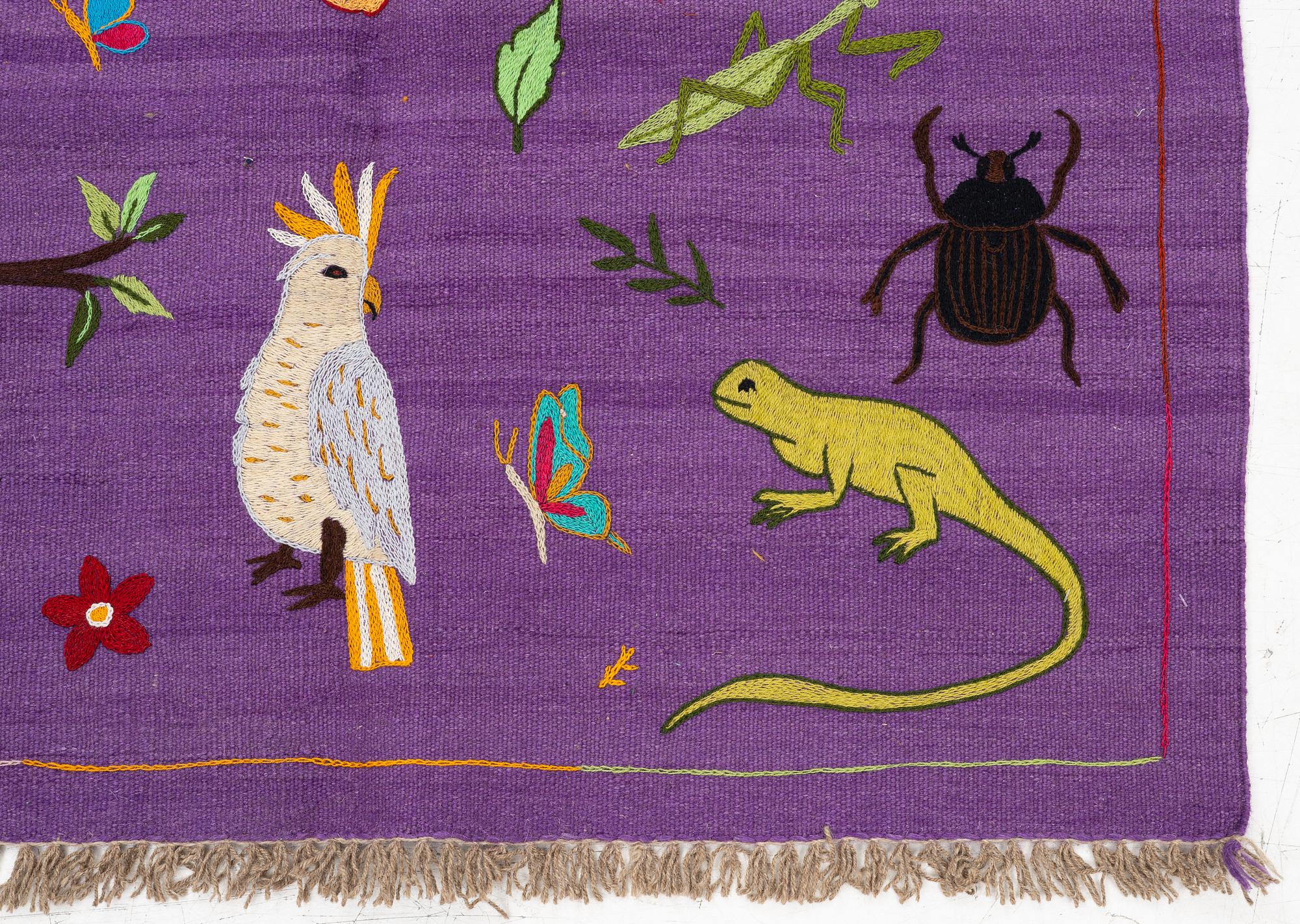 A hand-embroidered Kelim rug, c. 177 x 123 cm.