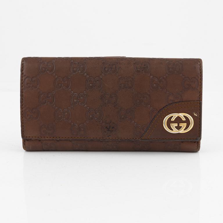 Gucci, leather wallet.