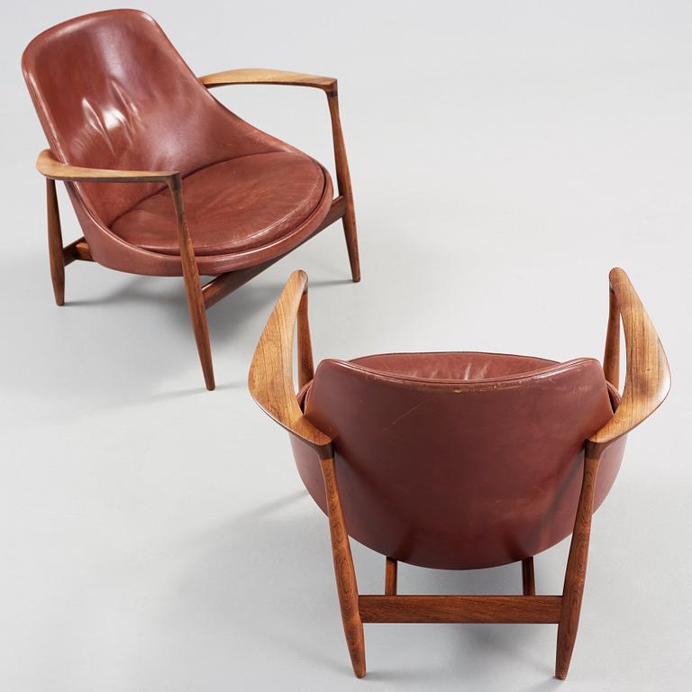 A pair of Ib Kofod Larsen palisander and brown leather 'Elisabeth' easy chairs, Denmark 1950's-60's.