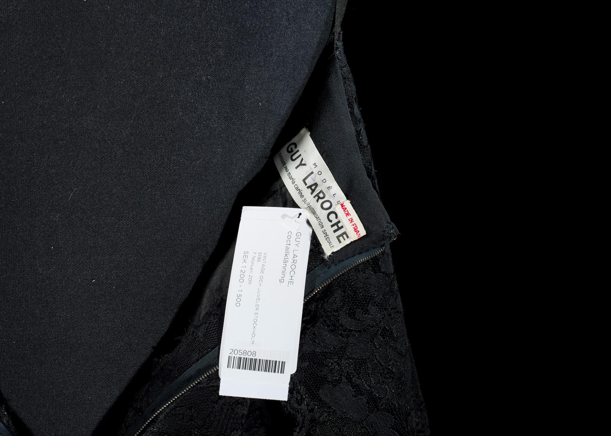 A black lace and silk cocktail dress from Guy Laroche.