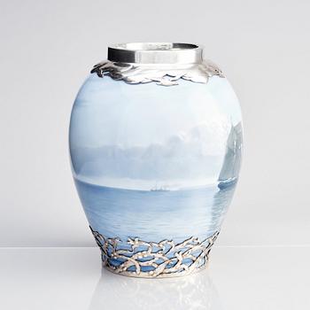 Anton Michelsen, & Royal Copenhagen, a porcelain vase, model 1634, base and mouth of sterling silver, Copenhagen 1914.