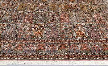 A Kashmir silk carpet, 418 x 297 cm.