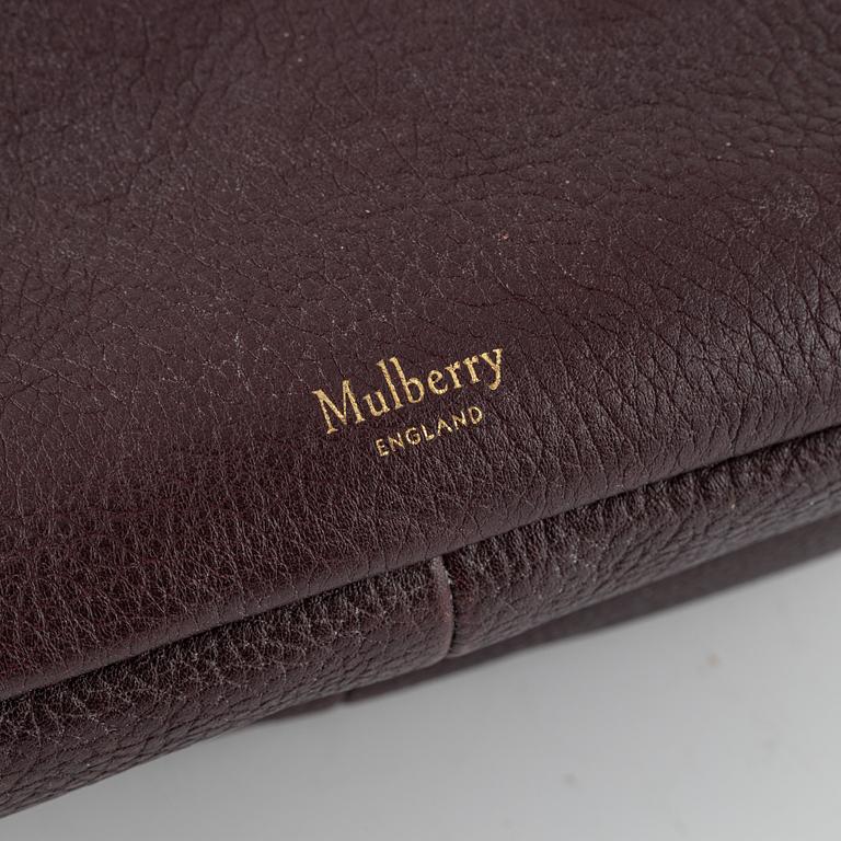 Mulberry, a burgundy leather handbag.