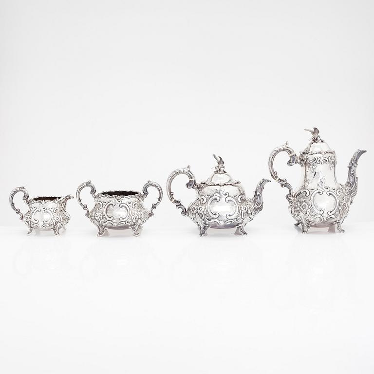 A Victorian four-piece sterling silver coffee and tea service, maker's mark of William Smily, London 1856.