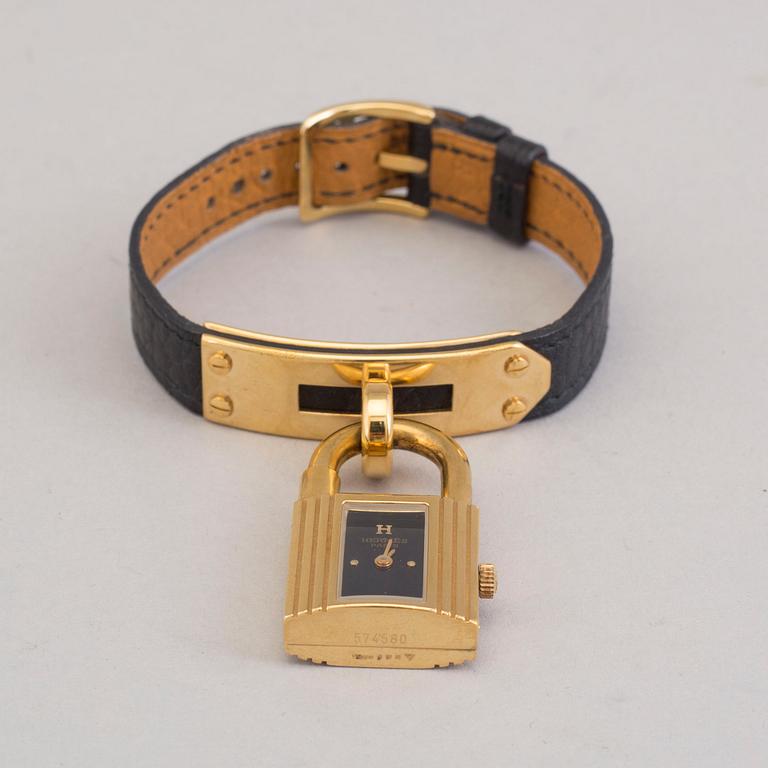 A watch "Kelly Lock" by Hermès.