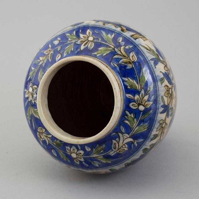 A POTTERY URN, probably late Qajar dynasty, Persia/Iran, height ca 27,5 cm.