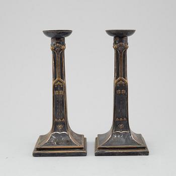 A pair of plate candlesticks from around year 1900.