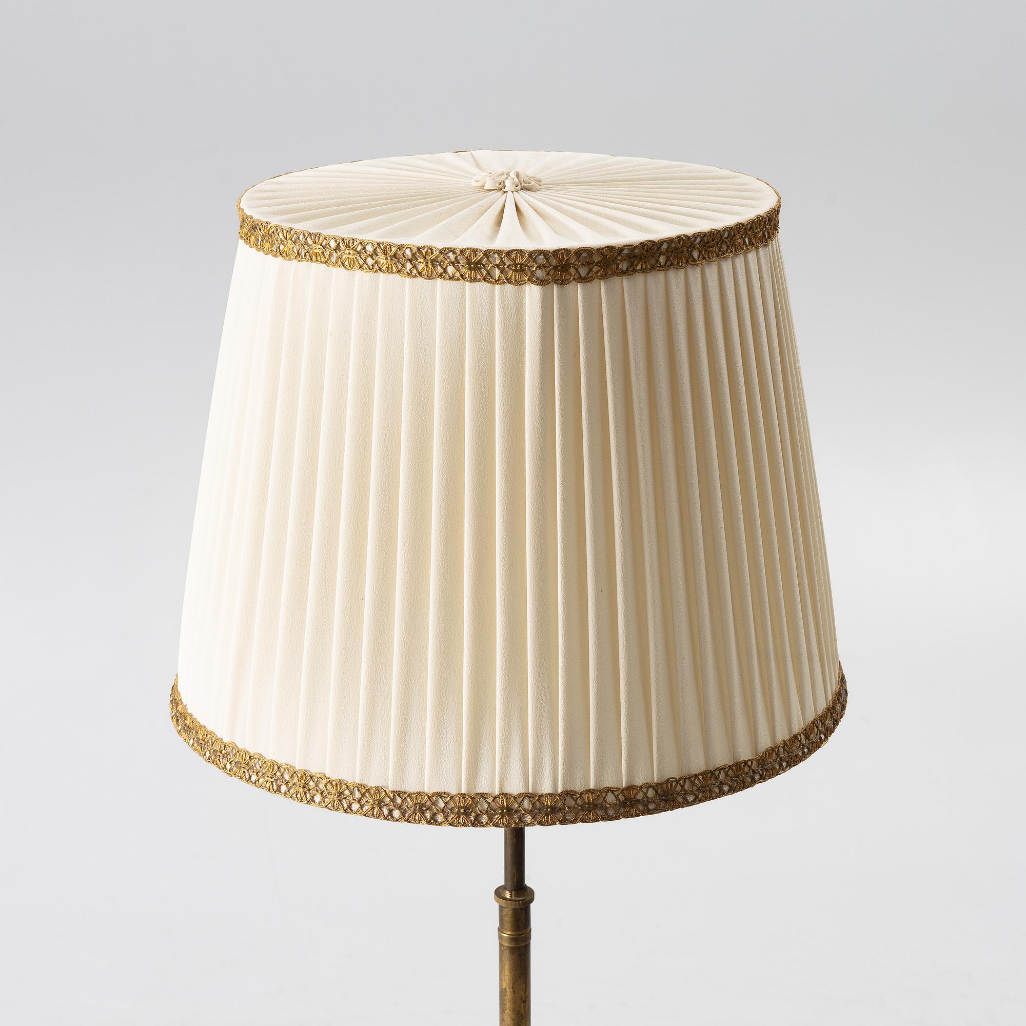 A brass floor lamp, 1940s.