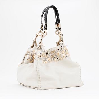 JIMMY CHOO, a white leather handbag with studs.
