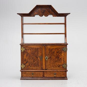 A late Baroque wall cabinet with shelves, first half of the 18th century.