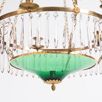 A late Gustavian gilt-brass and green glass six-light chandelier, late 18th century.