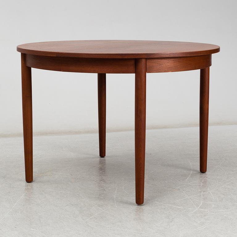 a teak dining table from the second half of the 20th century.