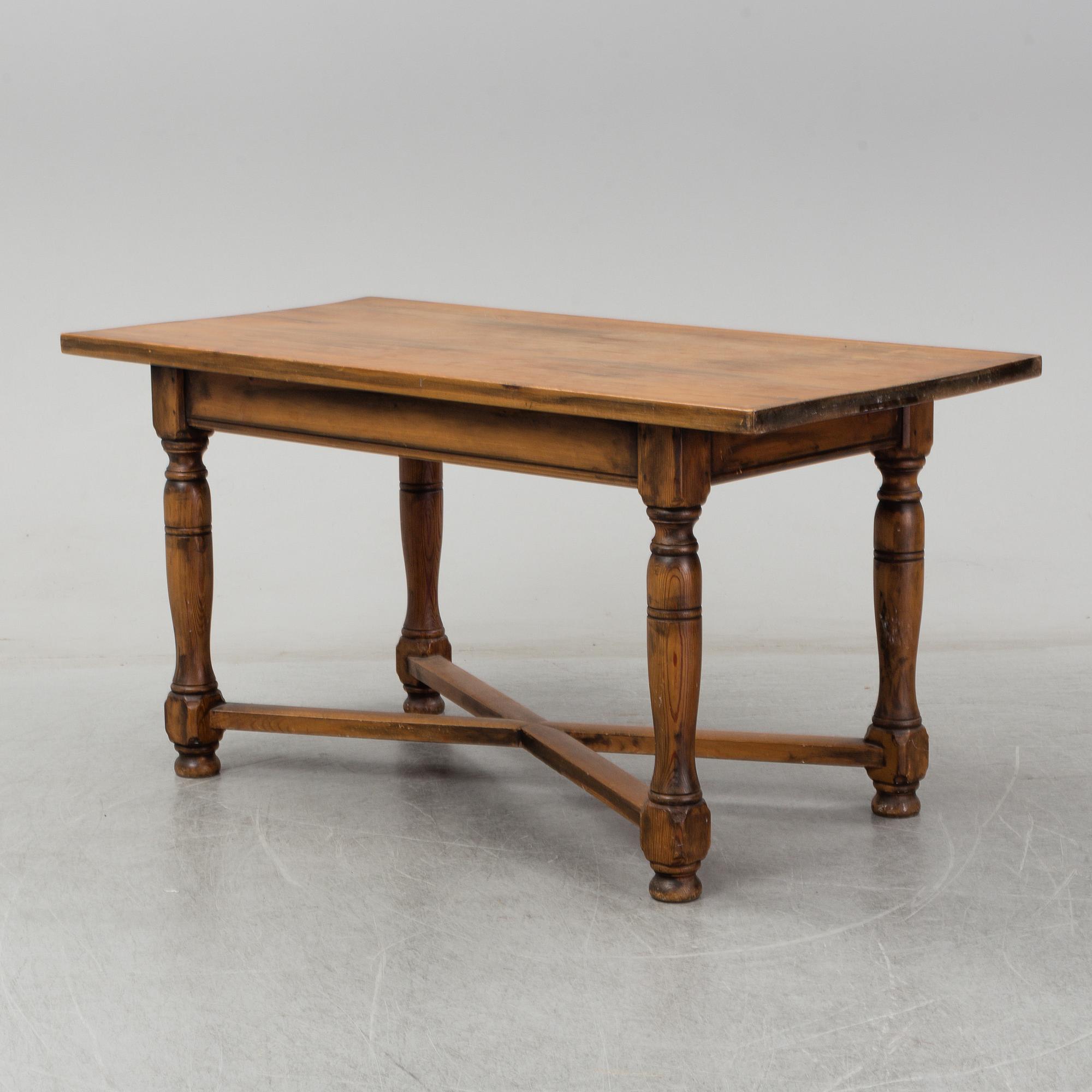 A pine table, circa 1900.